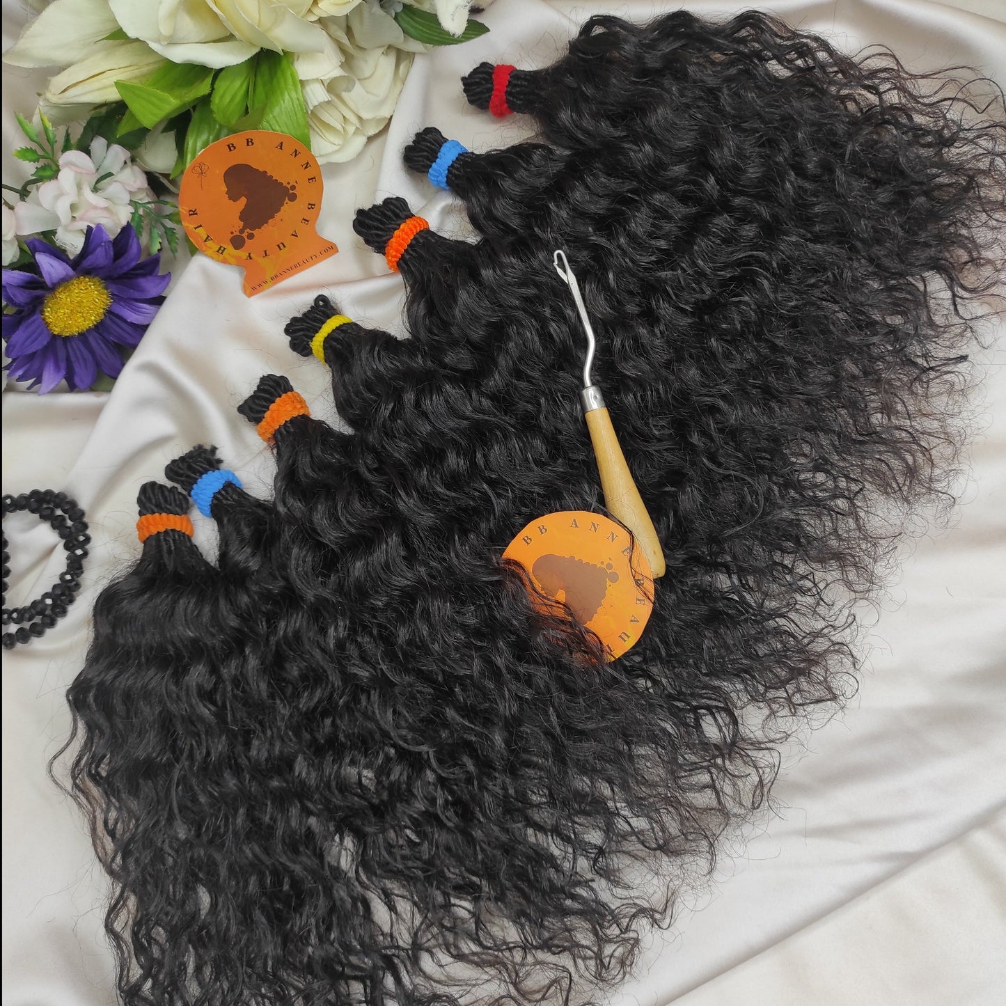 Image shows a person with curly crochet braids and a bundle of the same hair extension product. The second image displays the hair in its natural curly state.