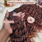 Pre-looped synthetic hair extensions with AMARA Loose Deep color on a hand, surrounded by flowers.