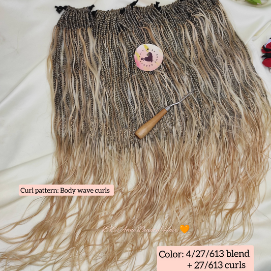 Hair extension with tools on a white surface, surrounded by decorative flowers.