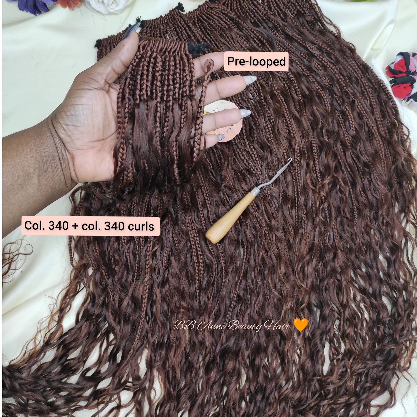 Pre-looped hair extensions with a crochet hook on a floral background, labeled 'Boho Goddess 2X' and 'BB Anne Beauty Hair'.