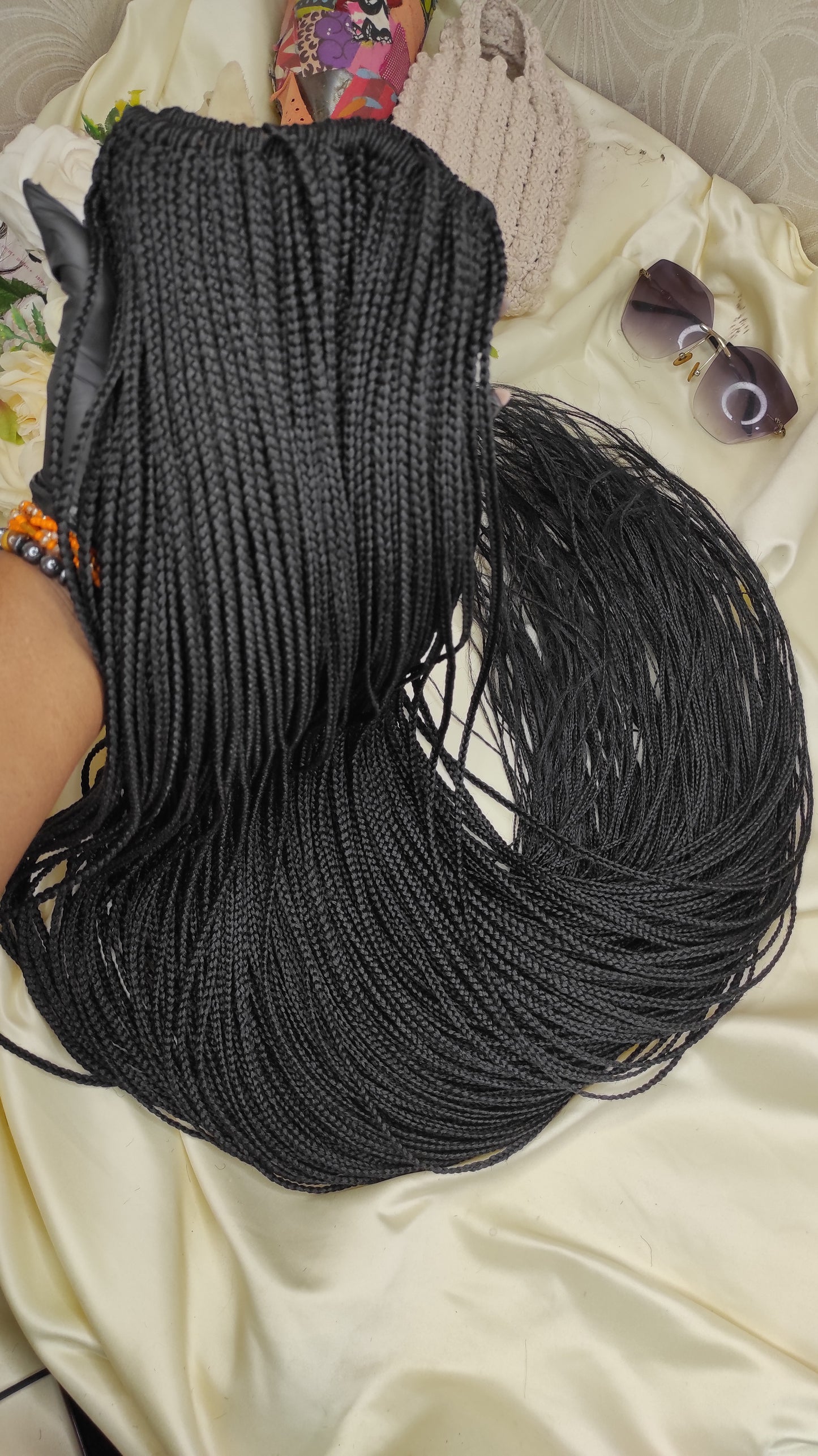 Large ball of black yarn on a light-colored surface