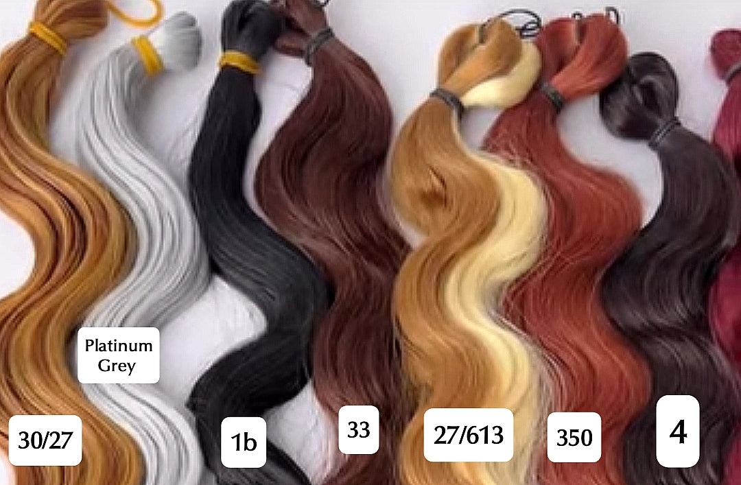 Six bundles of wavy hair extensions in various colors and tones are displayed side-by-side on a white background, with color labels and shade numbers overlaid.