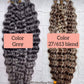 Two bundles of wavy hair extensions, one labeled 'Color Grey' and the other 'Color 27/613 blend', on a white tiled background.