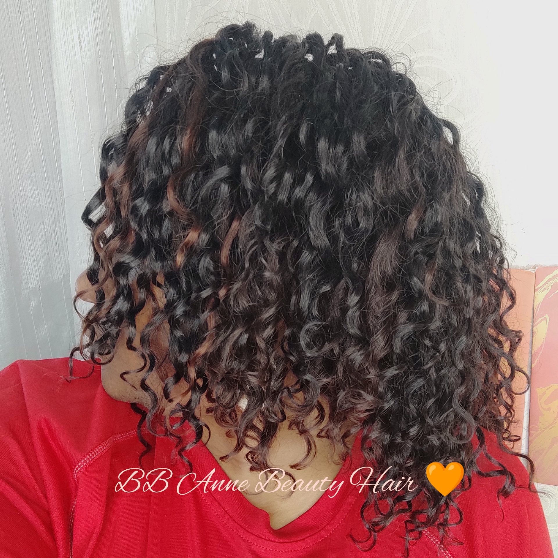 Curly dark brown to black hair with subtle warm brown highlights, BB Anne Beauty Hair' 